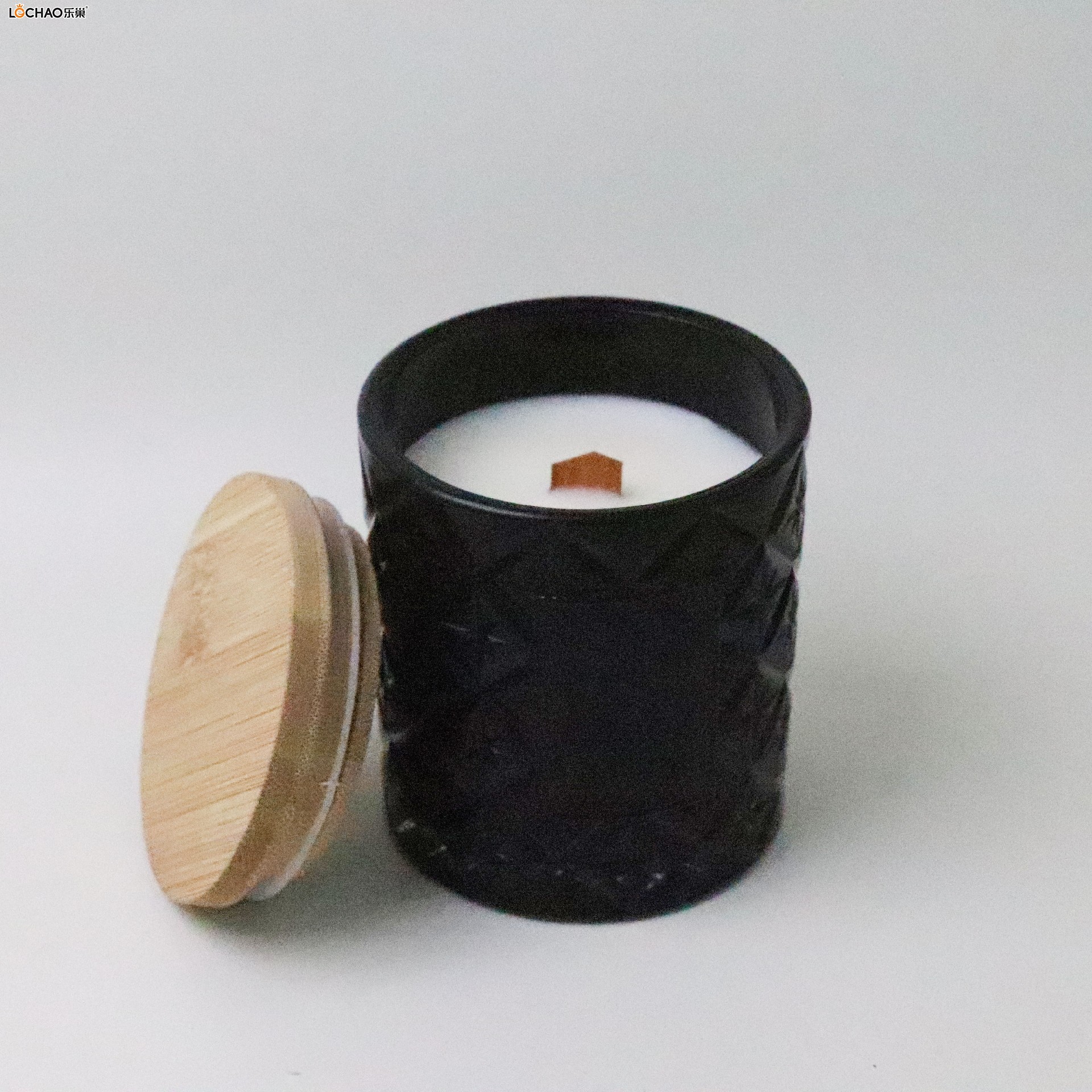 Embossed glass bottle scented candle