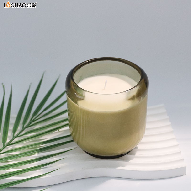 Thick round-bottomed glass cup candles