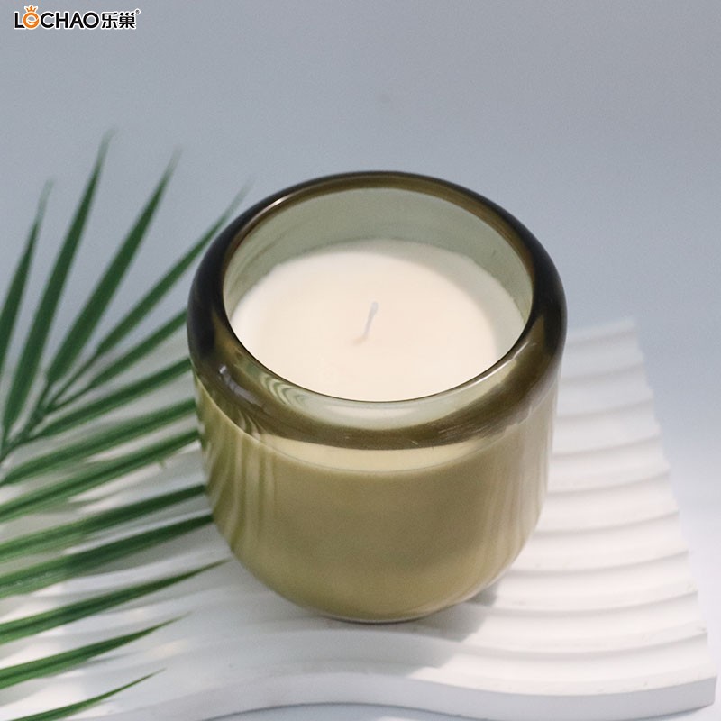 Thick round-bottomed glass cup candles