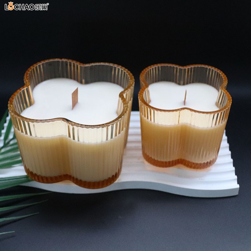 Why does a wood-core scented candle burn with a weak flame?