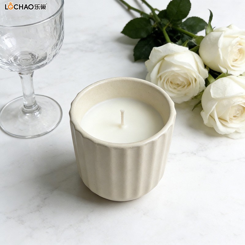 How does the fragrance of the scented candles spread?