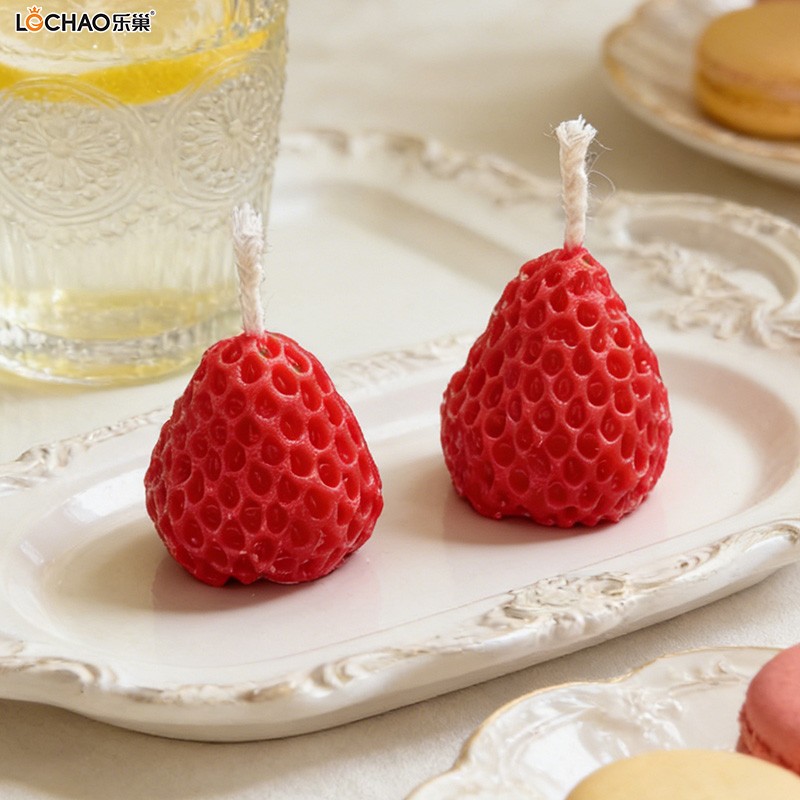 Strawberry-shaped fragrance candle