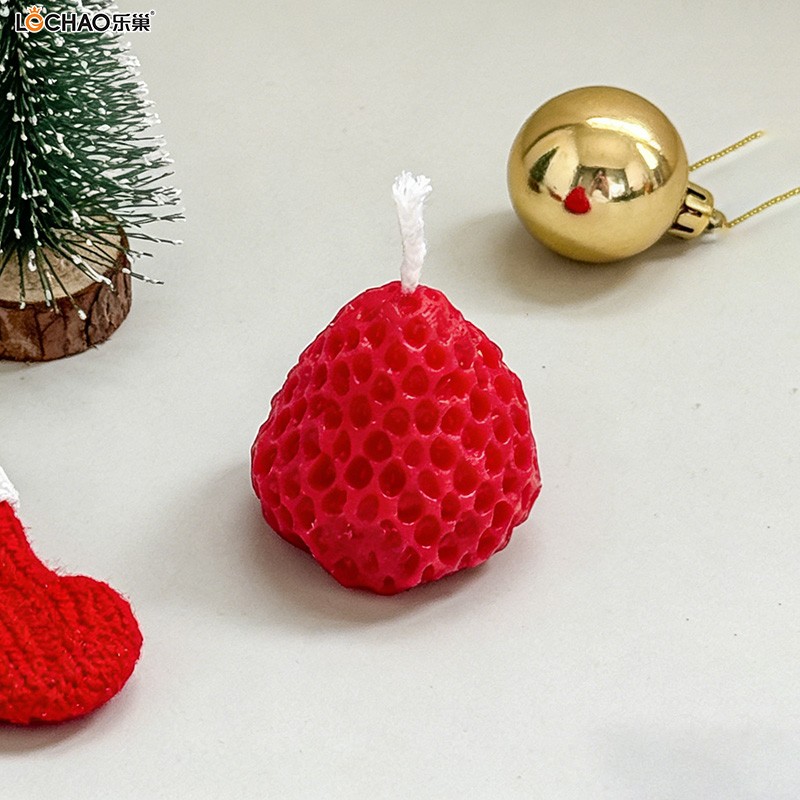 Strawberry-shaped fragrance candle