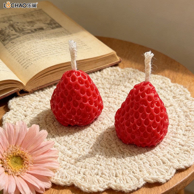 Strawberry-shaped fragrance candle