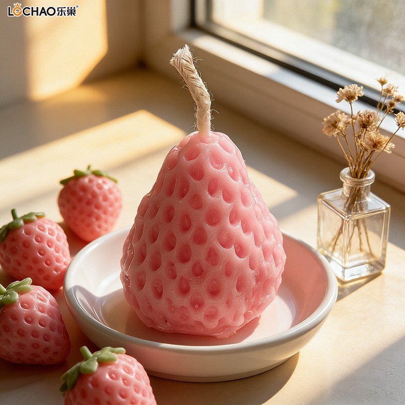 Strawberry-shaped fragrance candle