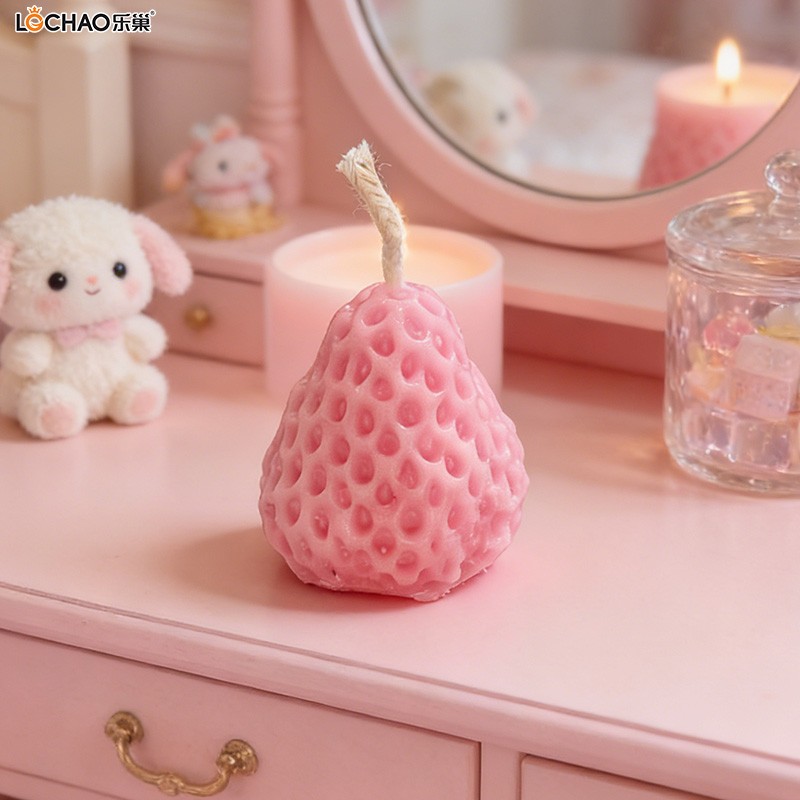 Strawberry-shaped fragrance candle